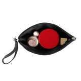 inside cosmetics bag by Scott Kish